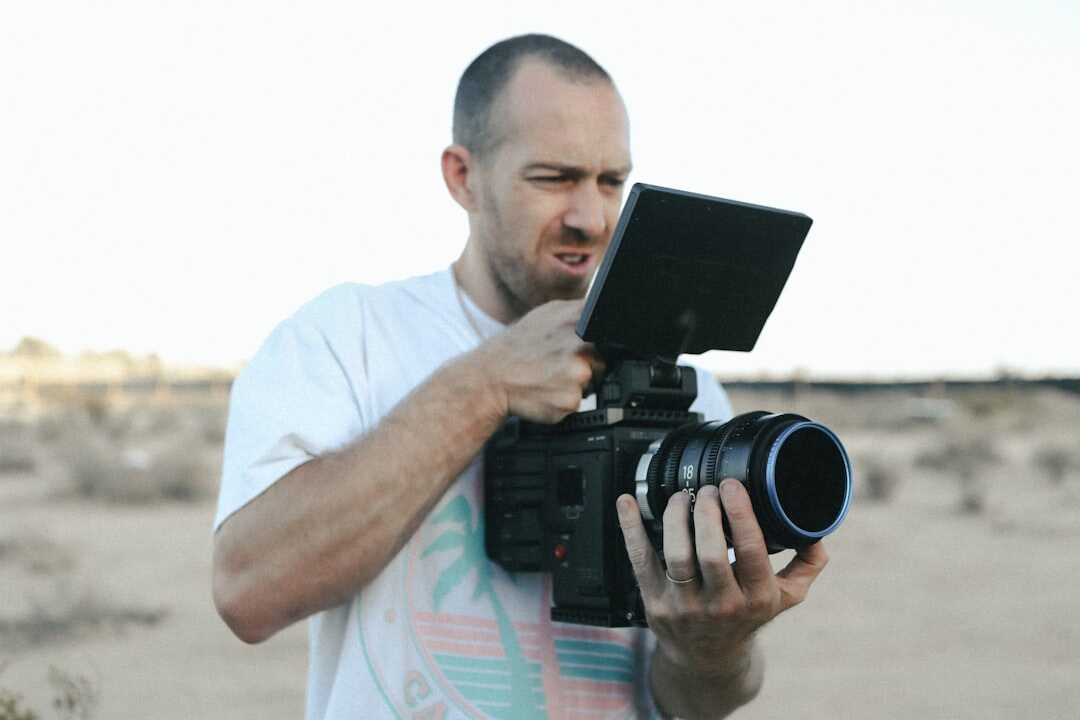 Journalist using digital reporting technology in the field